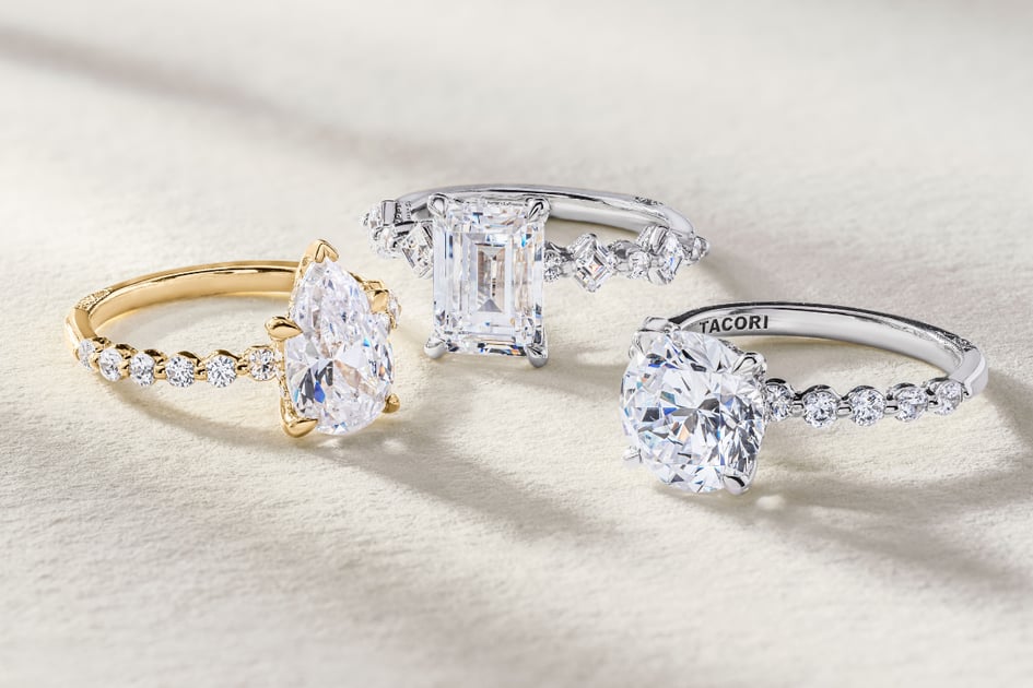 three diamond engagement rings with different center stone cuts